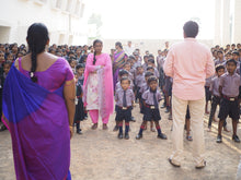 Load image into Gallery viewer, A group of Indian children in uniform with their teachers. The teachers are ready to devote their lives to teach and educate victims of trafficking