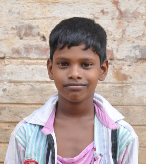 Little Indian boy with a white polo rescued from slavery or human trafficking