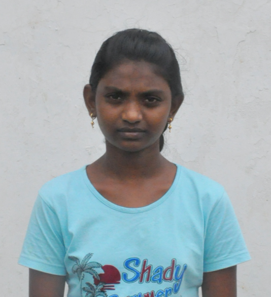 Little Indian girl with a light blue shirt rescued from slavery or human trafficking