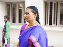 Load image into Gallery viewer, An Indian woman wearing pink. The teachers are ready to devote their lives to teach and educate children rescued from human trafficking